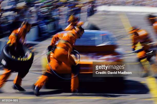 stock car pit stop during race, usa (digital enhancement) - pit stop stock pictures, royalty-free photos & images