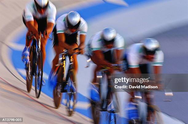 cyclists racing in velodrome (blurred motion) - cykelbana bildbanksfoton och bilder