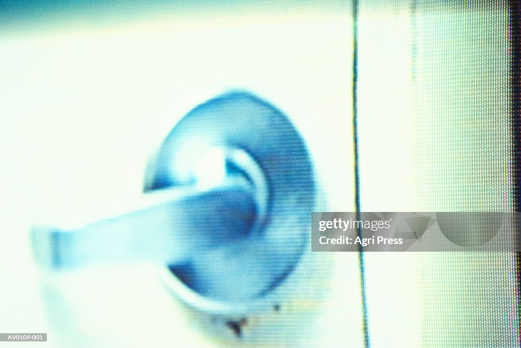 Door handle, close-up (video still)