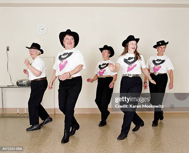 mature women, line dancing, dance studio - folkloric stock-fotos und bilder