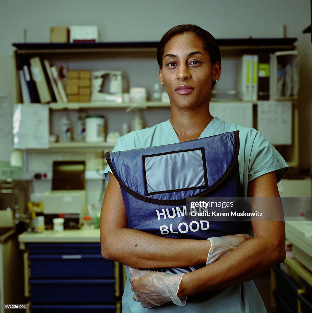Nurse holding blood bag