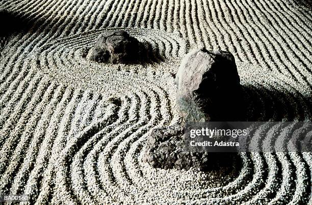 study of rocks in a zen garden / japan - karesansui stock-fotos und bilder