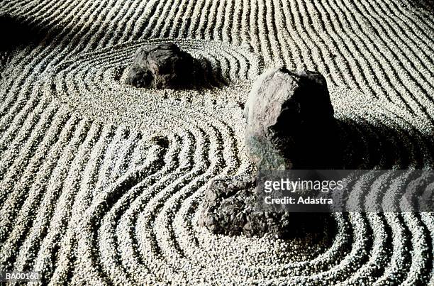 study of rocks in a zen garden / japan - karesansui photos et images de collection