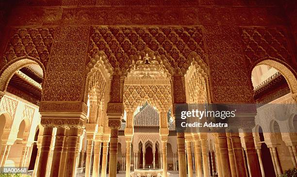 grand interior of alhambra palace / granada, spain - alhambra stock-fotos und bilder