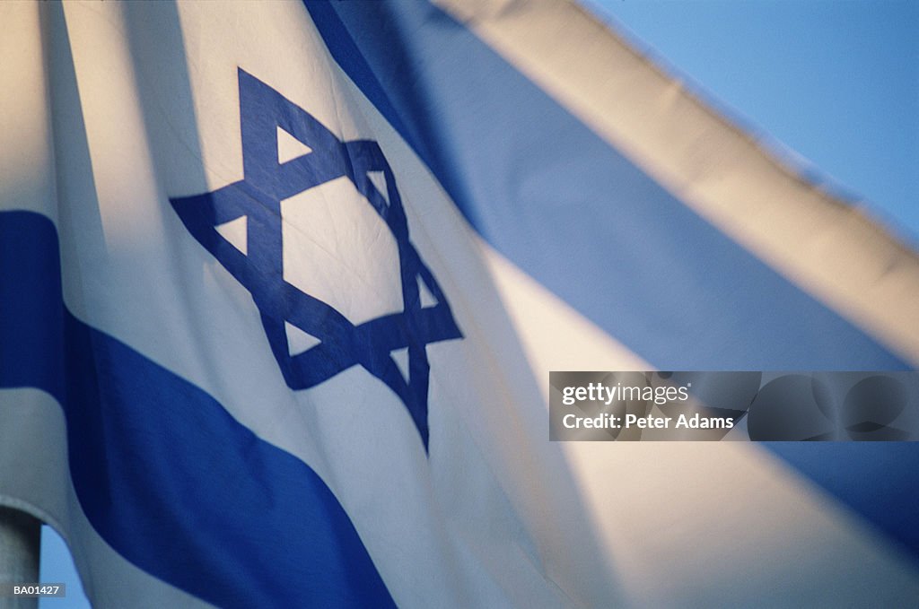 Flag of Israel with Star of David emblem, low angle view