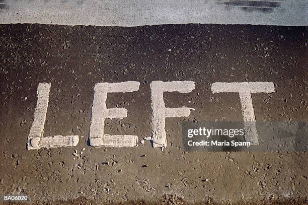 'left' sign painted on road, close-up (b&w) - marea stock pictures, royalty-free photos & images