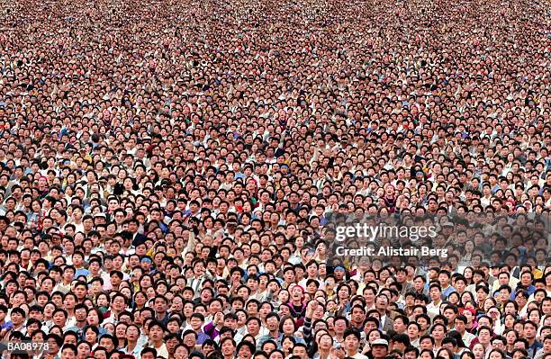 crowd of people looking upward, elevated view (digital composite) - abundance stock pictures, royalty-free photos & images