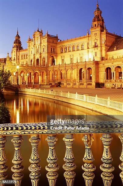 europe, spain, andulucia, plaza de espania at dusk - 20th century style stock pictures, royalty-free photos & images