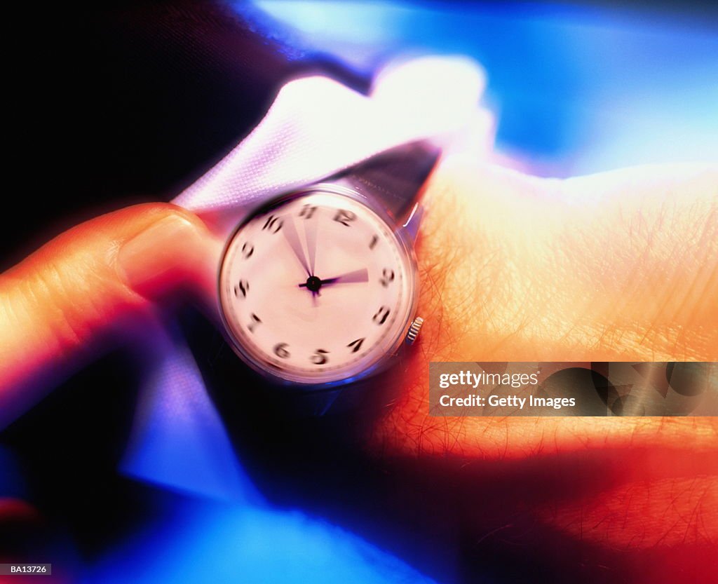 Watch on Businessman's Wrist, Blurred Motion