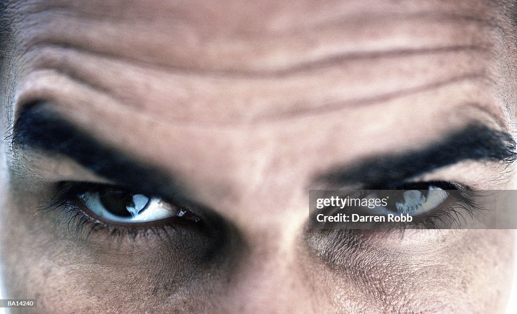 Man raising eyebrow, portrait, close-up