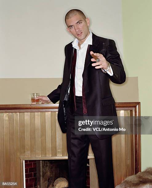 man holding cigar and drink, portrait - fashion suit stock pictures, royalty-free photos & images