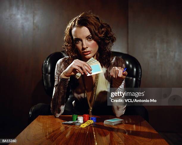 woman with playing cards and poker chips, portrait - antonio stock pictures, royalty-free photos & images