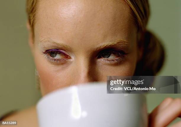 woman drinking from mug, close up - antonio stock pictures, royalty-free photos & images