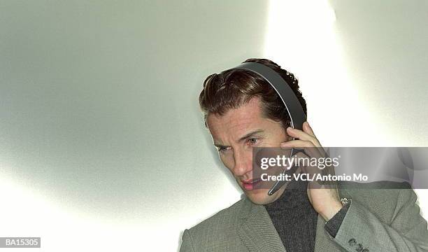 businessman wearing headset, close up - bizarre fashion stock pictures, royalty-free photos & images
