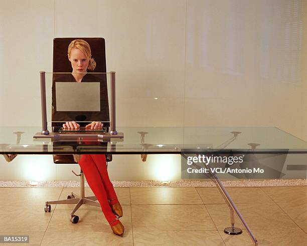 businesswoman using computer at desk - antonio stock pictures, royalty-free photos & images