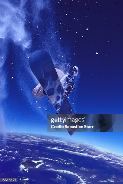 snowboarder in sky above globe section - starr stock pictures, royalty-free photos & images