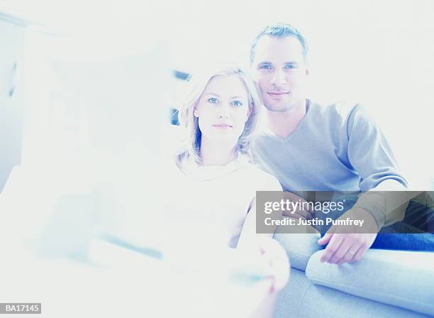 couple relaxing at home, portrait (cross-processed) - cross processed imagens e fotografias de stock