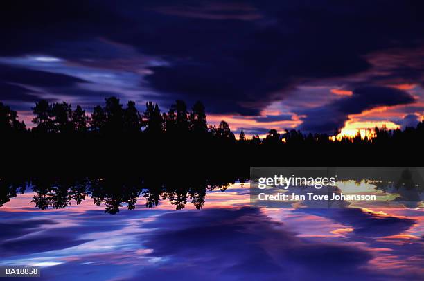 lake at dusk, sweden - g2 stock pictures, royalty-free photos & images