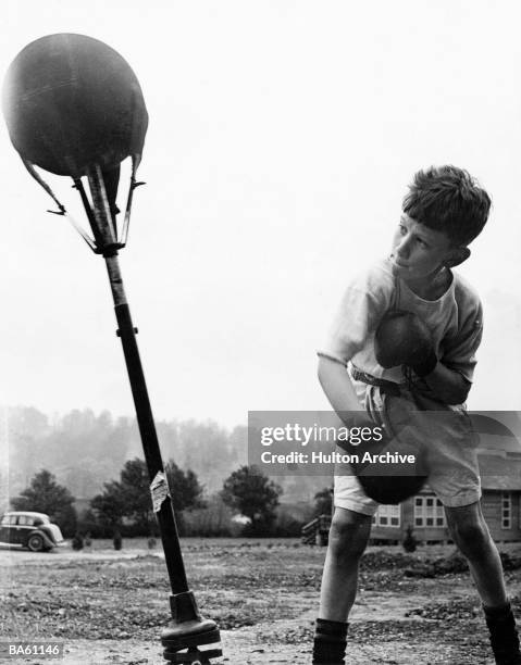 The boys evacuated to the Pixies' Hill Camp School at Hemel Hempstead, Hertfordshire, take part in boxing tournaments which are held periodically at...