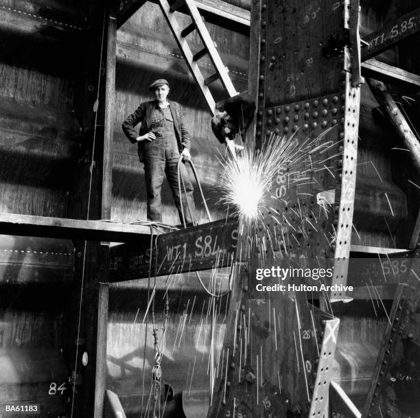 Welder sending sparks flying in Greenock shipyar