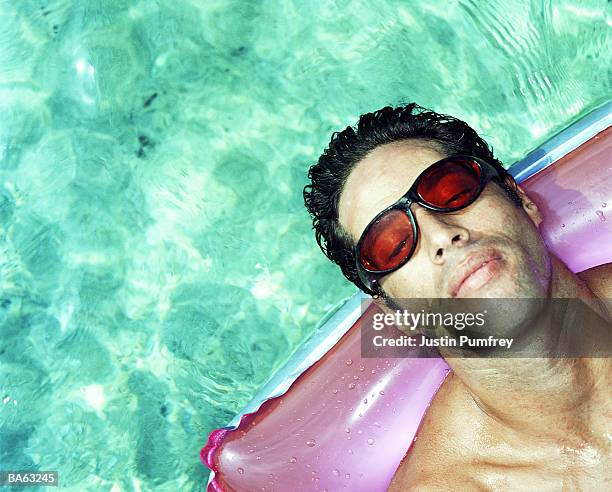 Guy On Inflatable Raft 1,291 Man Raft Pool Stock Photos, High-Res Pictures, and Images - Getty ...