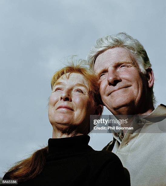 mature couple smiling, outdoors, close-up - phil stock pictures, royalty-free photos & images