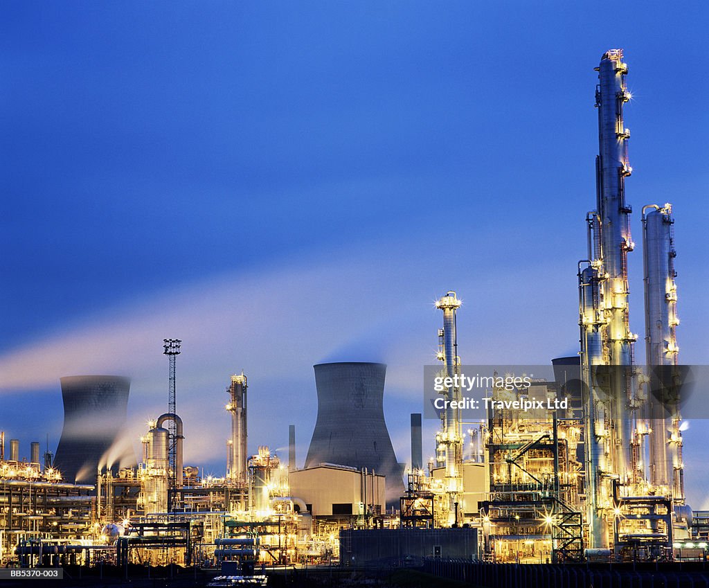 Petrochemical plant illuminated at dusk, Grangemouth, Scotland