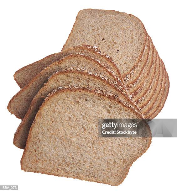 loaf of whole wheat bread, sliced - loaf stock pictures, royalty-free photos & images