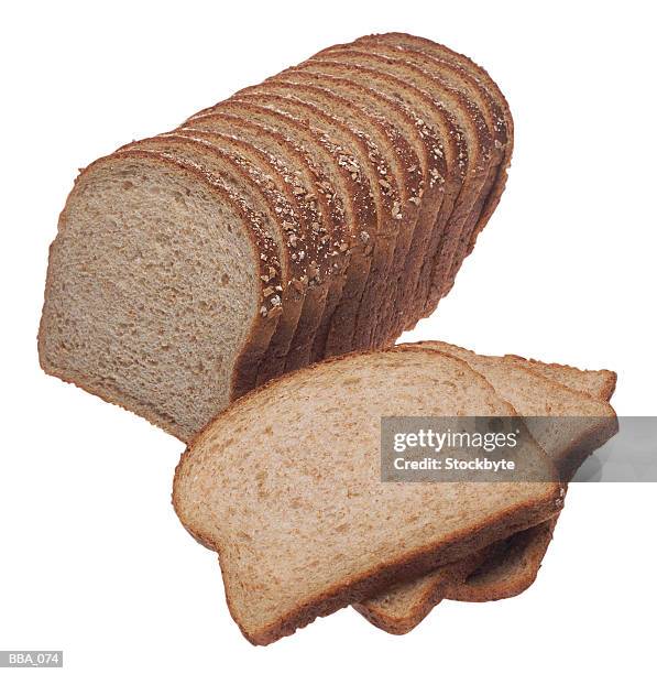 loaf of whole wheat bread, sliced - loaf stock pictures, royalty-free photos & images