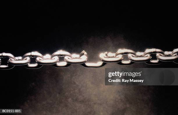 length of metal chain with broken link - broken shackles stock pictures, royalty-free photos & images