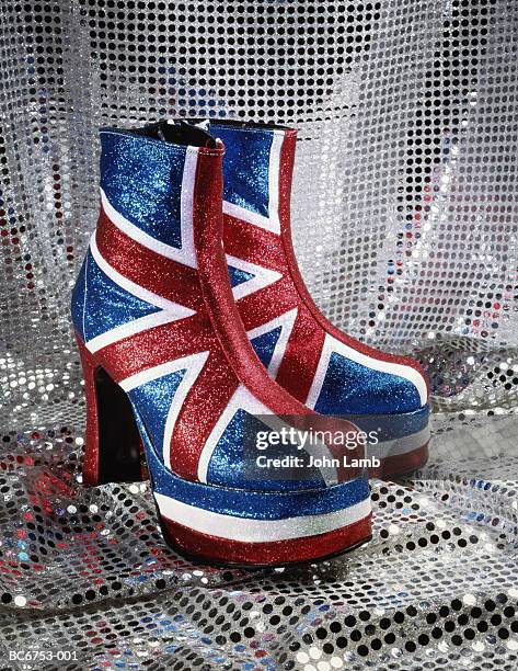 pair of union jack platform boots, close-up - old uk flag stockfoto's en -beelden