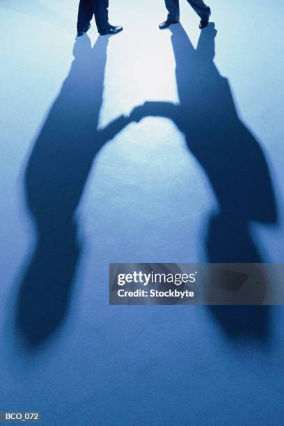 Two Men In Shadow 1,471 Shadow Shaking Hands Stock Photos, High-Res Pictures, and Images ...