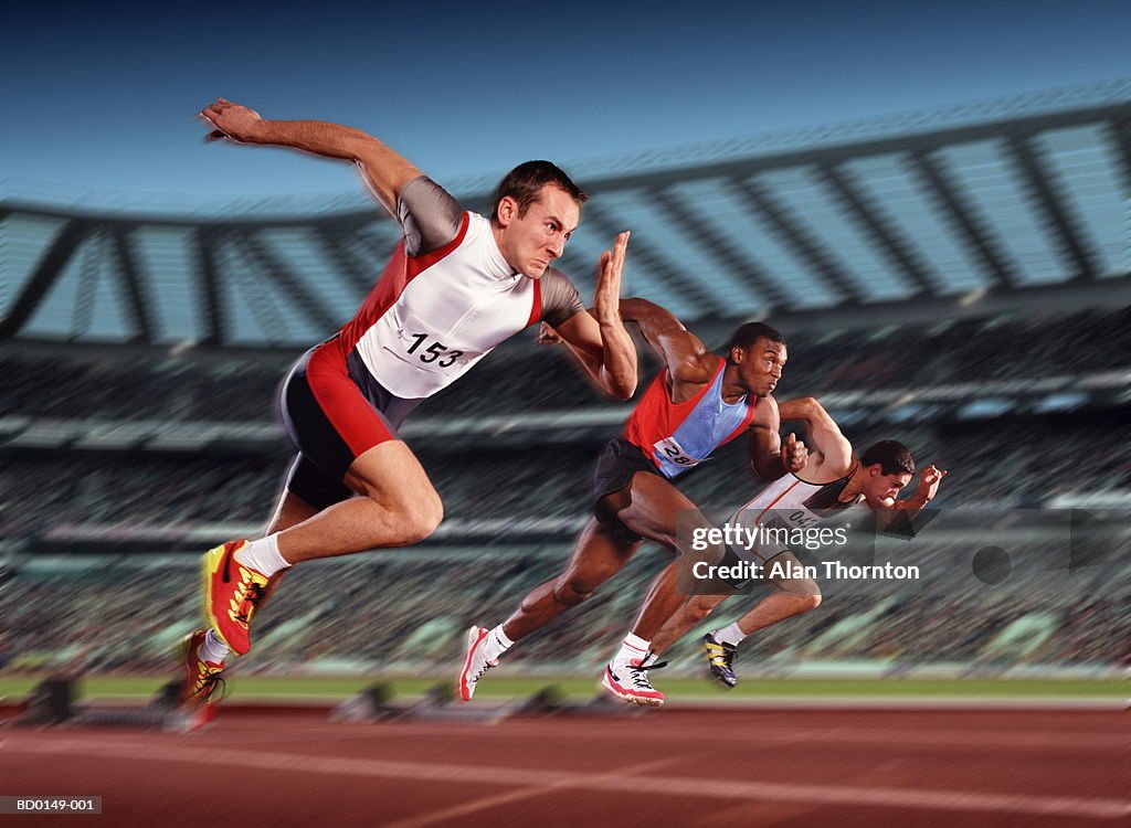 Male athletes leaving starting blocks (Digital Composite)