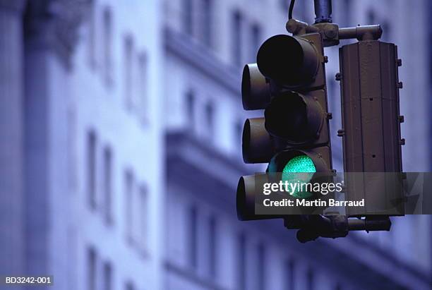 green traffic light, low angle view - sinal rodoviário imagens e fotografias de stock