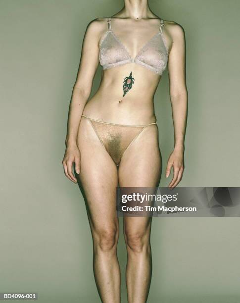 woman with tattoo wearing see-through bra and knickers - pelo do corpo - fotografias e filmes do acervo