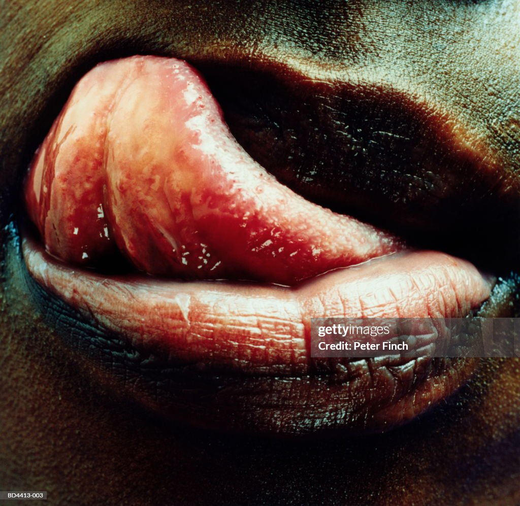 Woman's mouth, licking lips, close-up