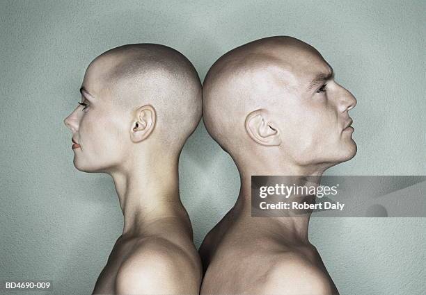 bald couple standing back-to-back, close-up - shaved head bildbanksfoton och bilder