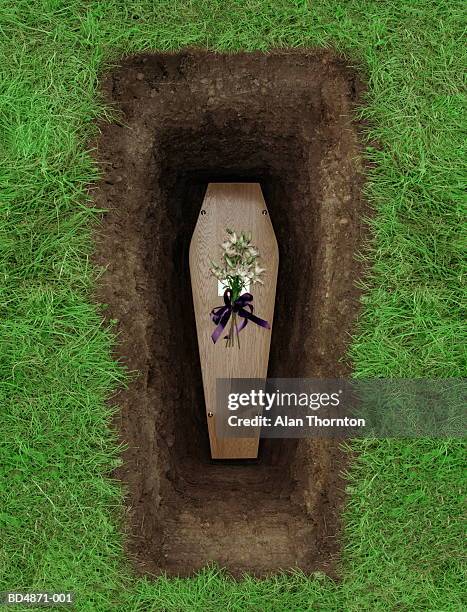 coffin in grave, overhead view - grab stock-fotos und bilder