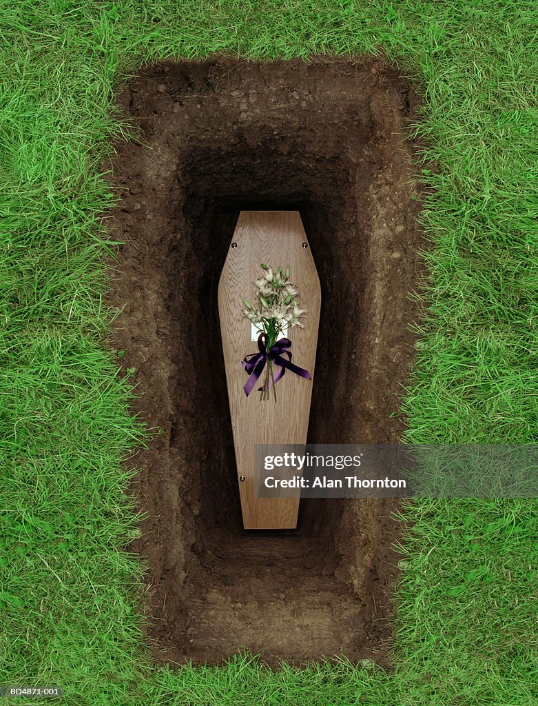 Coffin in grave, overhead view