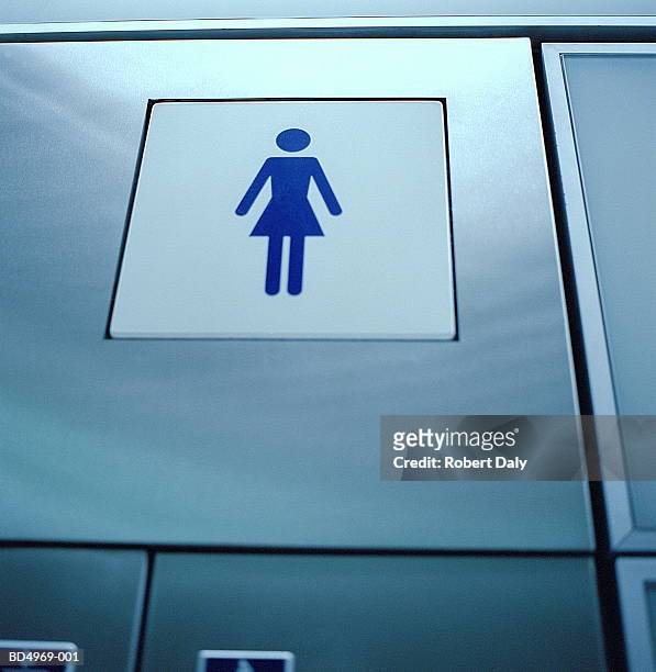 ladies toilet sign, close-up, low angle view - 女性用トイレ ストックフォトと画像