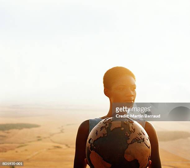 woman holding globe, outdoors, portrait - goddess stock pictures, royalty-free photos & images