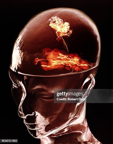glass head with explosion in brain - hirnverbrannt stock-fotos und bilder