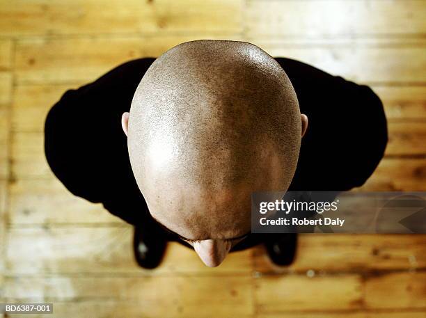 bald man, overhead view - shaved head stock pictures, royalty-free photos & images