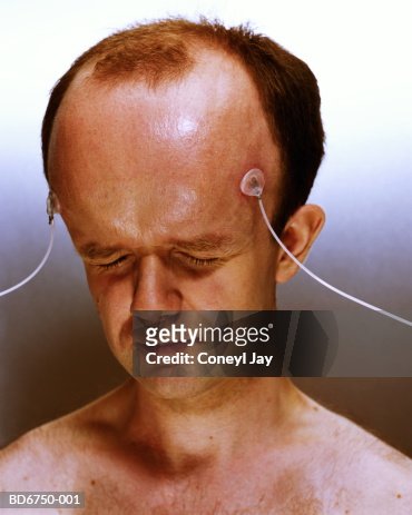 electrodes-attached-to-mans-head-portrait.jpg