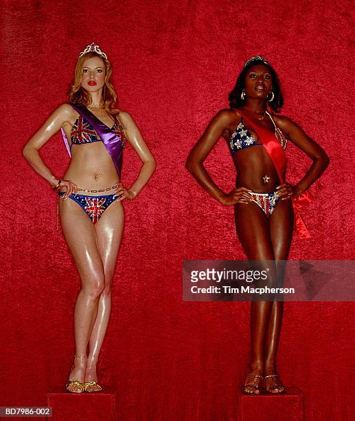 two women in 'union jack' and 'stars and stripes' bikinis - beauty contest stock pictures, royalty-free photos & images