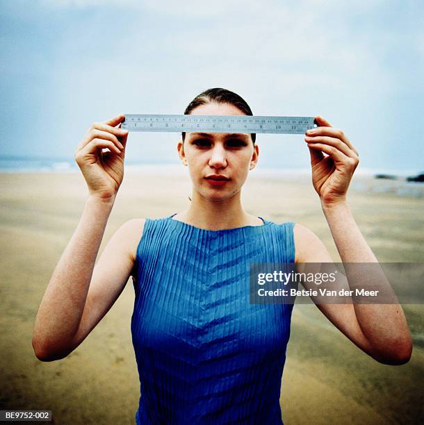 Lady With Ruler 5,170 Woman Holding Ruler Stock Photos, High-Res Pictures, and Images ...