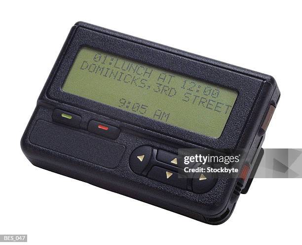 pager with digital display - pager stock pictures, royalty-free photos & images