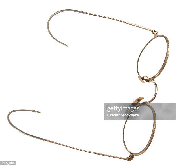 top view of vintage eyeglasses with wire frames - granny glasses stockfoto's en -beelden