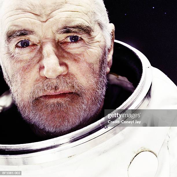 mature male astronaut, portrait, close-up - astronaut potrait stock-fotos und bilder