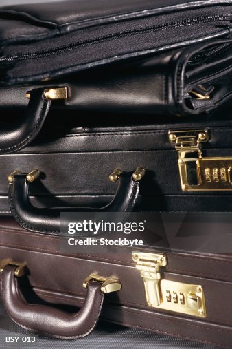 Stack of three briefcases Stack of three briefcases